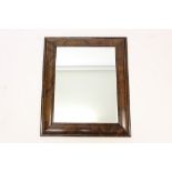 18th century-style walnut grained cushion frame wall mirror,