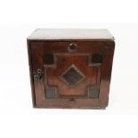 Late 17th century oak geometric moulded spice cupboard,