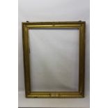 19th century gilt gesso picture frame with flower-head motifs and leaf borders,