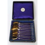 Set of twelve late 19th century silver spoons with silver gilt bowls,