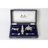Contemporary silver condiment set - comprising salt and mustard with blue glass liners,