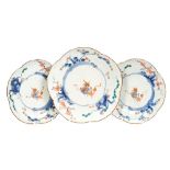 Three early 18th century Japanese Kakiemon palette petal-shaped dishes finely painted with ShiShi