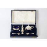 Contemporary silver condiment set - comprising salt and mustard with blue glass liners,