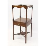 George III mahogany washstand of square form, the top with circular apertures,