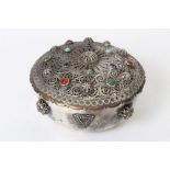 Middle Eastern or Indian white metal box of circular form,
