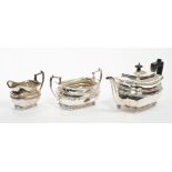 Contemporary three piece silver tea set - comprising teapot of compressed baluster form,