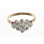 Diamond cluster ring with a cluster of nine brilliant cut diamonds in claw setting,