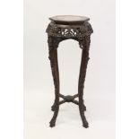 Late 19th / early 20th century Chinese marble-topped carved padouk urn stand,