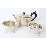 1920s silver three piece tea set - comprising teapot of cauldron form, with flared shaped border,