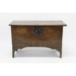 17th century oak five-plank coffer of small size, the single plank top with chip-carved ends,