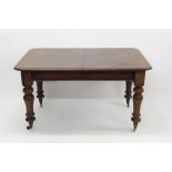 Early Victorian mahogany extending dining table,