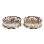 Pair George III silver wine coasters of circular form, with pierced decoration,