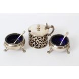 Victorian silver mustard pot of cylindrical form, with pierced vine decoration, blue glass liner,