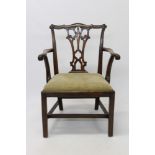 George III mahogany elbow chair with carved undulating top rail and lattice pierced vase-shaped