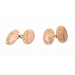 Pair 1920s 9ct rose gold cufflinks with engraved oval panels (Birmingham 1922),