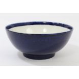 18th century powder-blue punch bowl raised on circular foot,
