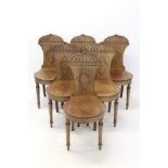 Rare and fine set of six Regency mahogany hall chairs,
