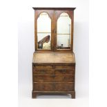 Good Queen Anne walnut crossbanded and feather-banded bureau cabinet,