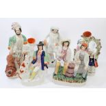 Five large Victorian Staffordshire figure groups - including 'The Lion Slayer',