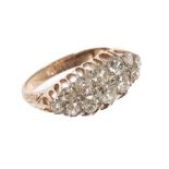 Late Victorian diamond ring with a boat-shape cluster of twelve old cut diamonds estimated to weigh