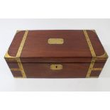 Early 19th century mahogany and brass bound writing slope with vacant shaped rectangular cartouche