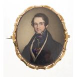 19th century oval portrait miniature on ivory depicting a young gentleman,