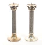 Pair 20th century Continental white metal pricket table candlesticks with textured columns,