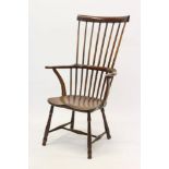 19th century elm, beech and fruitwood stick back Windsor chair with high back and swept arms,