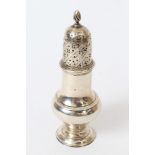 George III silver caster of shaped baluster form, with pierced slip-in cover,