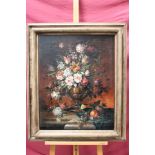 20th century Continental School oil on canvas laid on board - a profusion of summer flowers in an