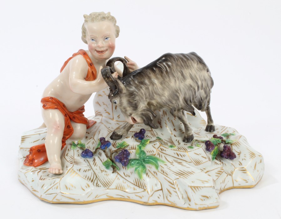 19th century German porcelain figure group of a boy with goat and grapes,