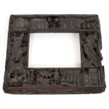 Highly unusual early 19th century primitive carved bog oak frame,