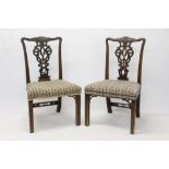 Elaborate pair of Chippendale-style side chairs,