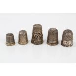 Early 19th century silver tall filigree thimble with vacant oval cartouche, unmarked, 3cm high,