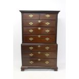 George III mahogany chest on chest with dentil cornice and having two short over six long graduated