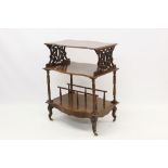 Victorian walnut Canterbury whatnot with three shaped tiers,