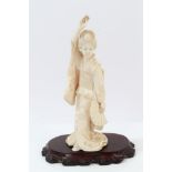 Japanese Meiji period carved ivory okimono of a Geisha dancing with a fan - two character signature