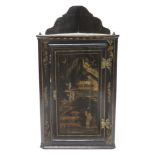 18th century black lacquered hanging corner cupboard with fret-carved gallery and interior of