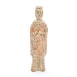 Ancient Chinese terracotta tomb figure of a court attendant with traces of decoration, circa 200BC,