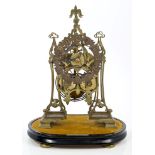 19th century brass skeleton clock with pierced architectural frame,