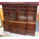 Large George III mahogany breakfront two-height bookcase, enclosed by Gothic astragal glazed doors,