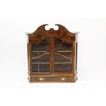 Late 18th / early 19th century Dutch walnut hanging cupboard with broken arch pediment and shaped