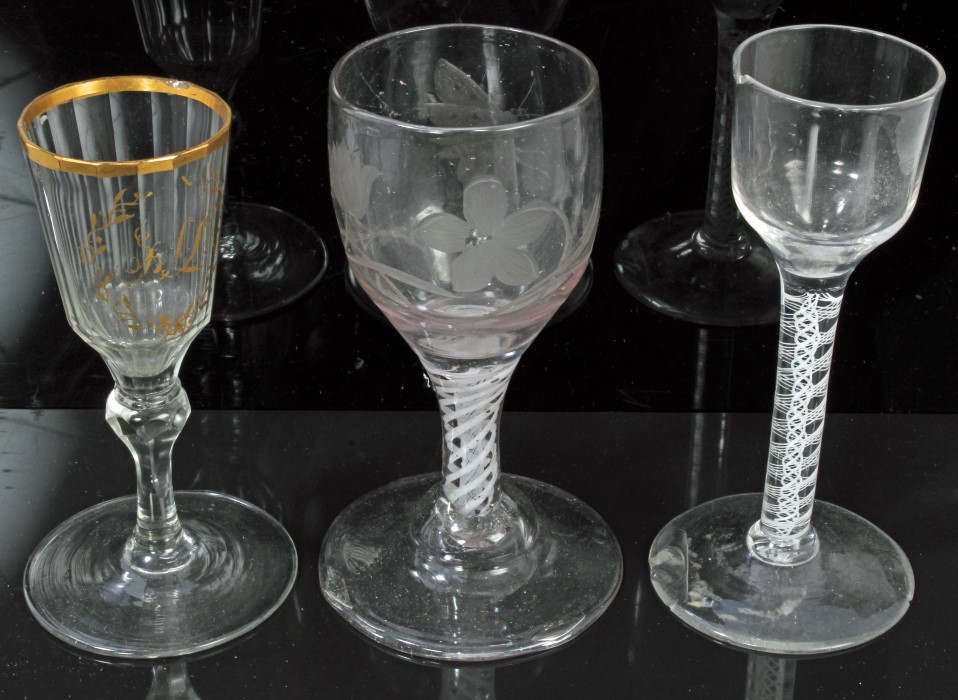 18th century wine glass with Jacobite-style engraved butterflies and floral decoration,