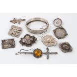 Collection of nine Victorian and later silver brooches and a Victorian silver hinged bangle