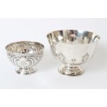 Late Victorian silver rose bowl of circular form, with embossed foliate and floral decoration,