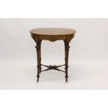 Victorian figured walnut and boxwood line-inlaid sewing table with oval hinged top,
