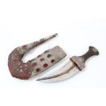 Old Arab jambia dagger with horn and white metal hilt,