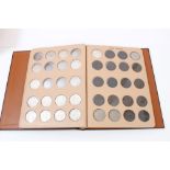 Canada - a brown 'Half Dollar' coin album containing mixed silver Half Dollars - to include