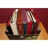 Accessories - two boxes containing coin albums and coin sleeves (11 albums)