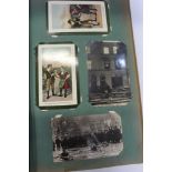 Postcards in two albums - including four real photographic cards of the Siege of Sydney Street,